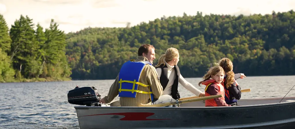 15 foot jon boat with a family onboard